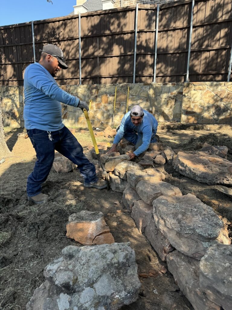 Mossy Boulder Retaining Wall as Drainage and Erosion Solution