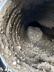 Dallas Drainage Pros find major blockage in main drain line on new home construction
