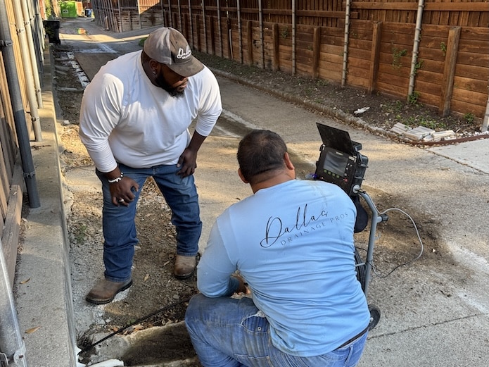 Dallas Drainage Pros inspects French drain